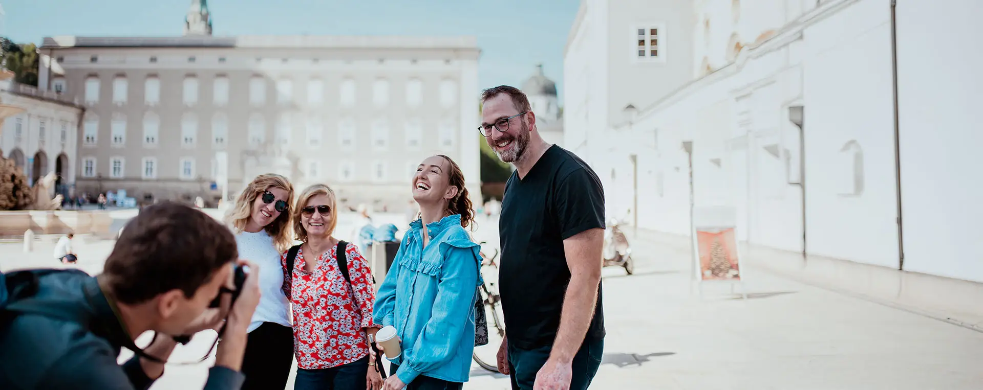 Tour group with guide at Residenzplatz Square in Salzburg