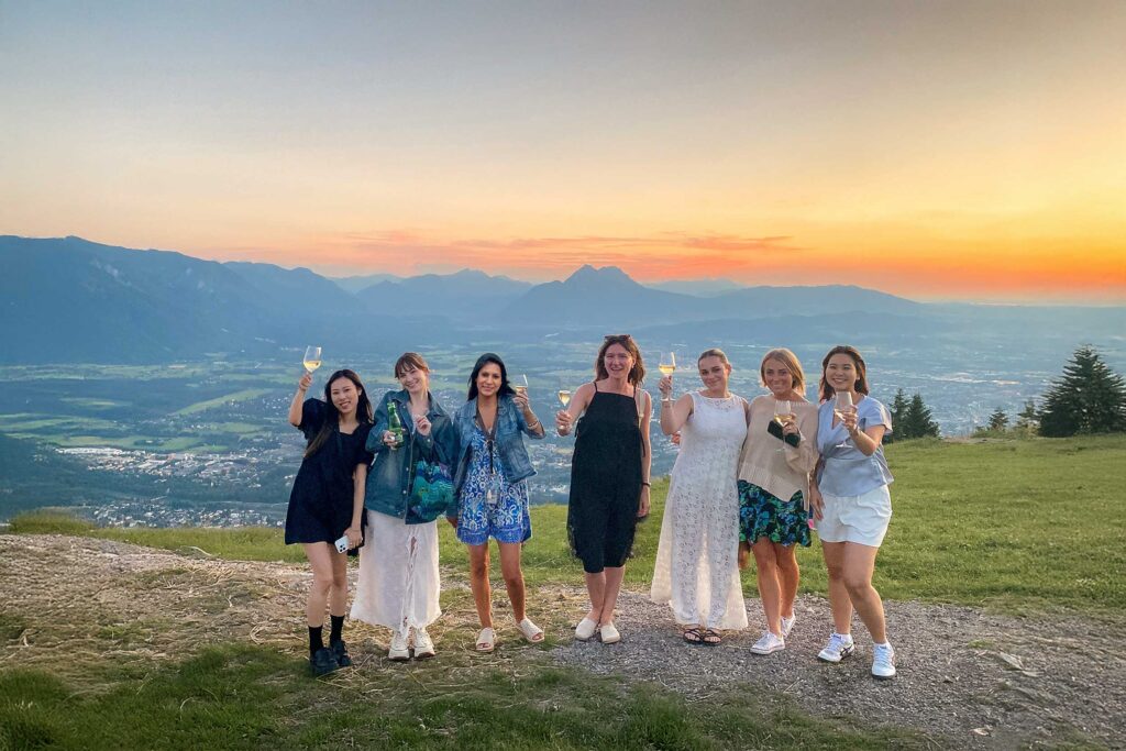 Group enjoying the Salzburg Sunset Tour at the Gaisberg summit with panoramic city views