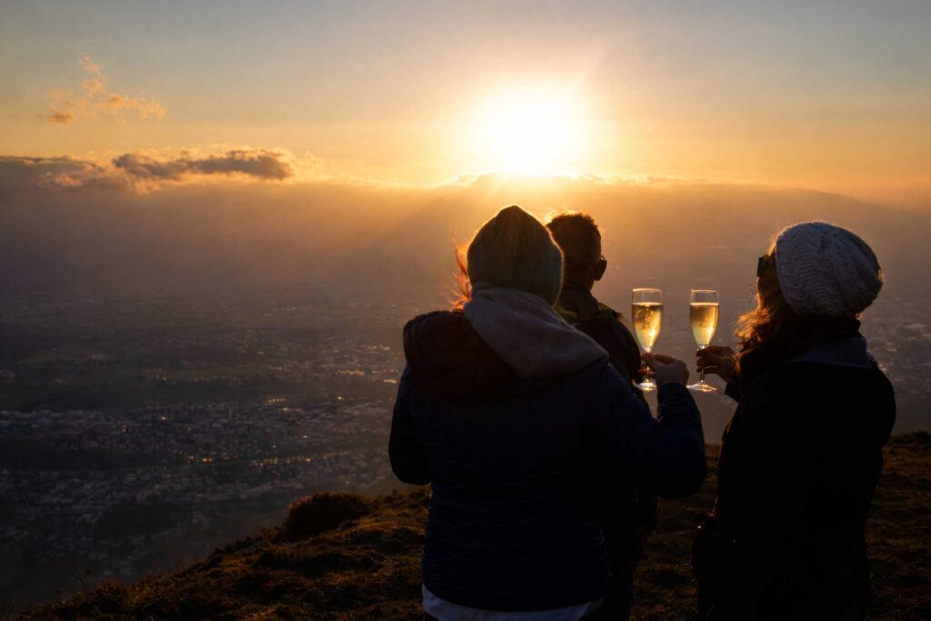 Sunset silhouettes at the Gaisberg summit during the Salzburg Sunset Tour
