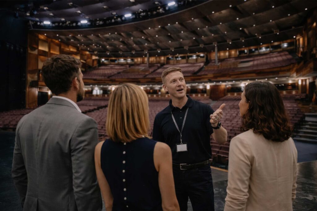 on stage Großes Festspielhaus Salzburg Festival behind the scenes tour guide with guests