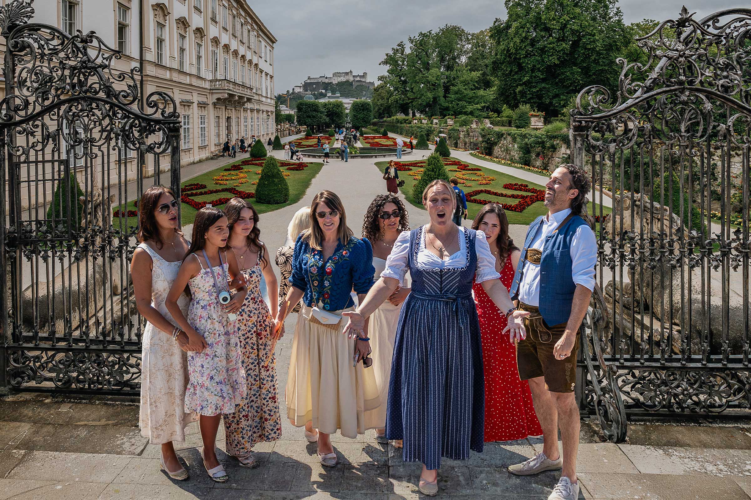 Professional singers with guests at an iconic Sound of Music filming location in Mirabell Gardens Salzburg