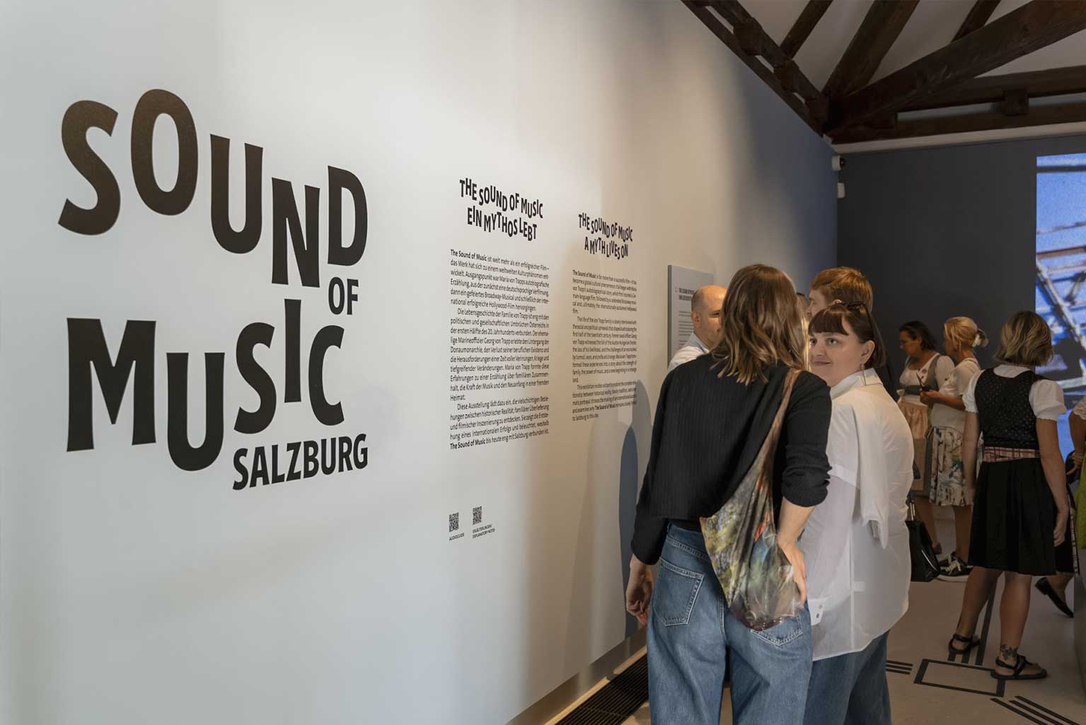 Visitors exploring the Sound of Music Museum Salzburg exhibition